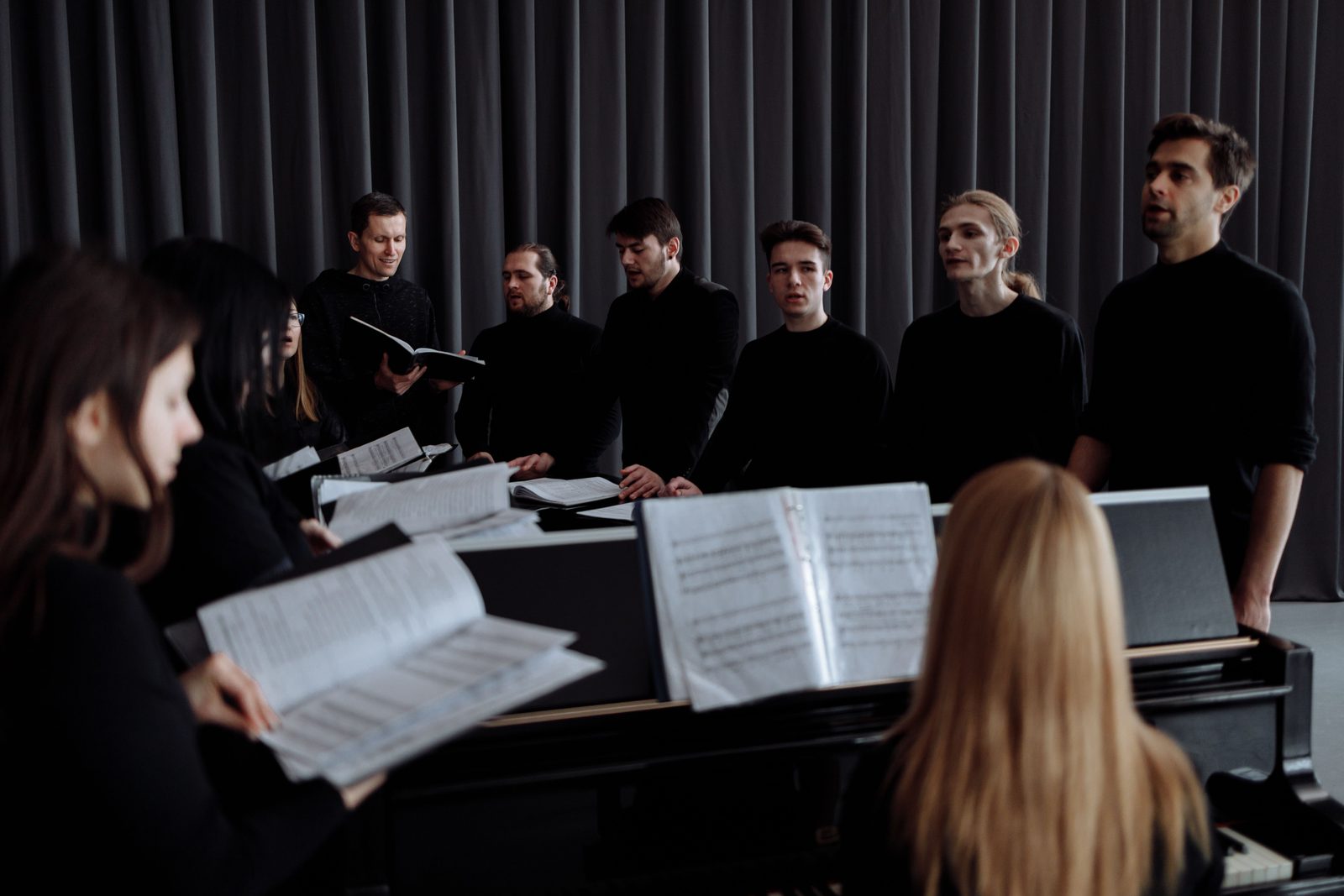 Singers rehearsing together in a community choir