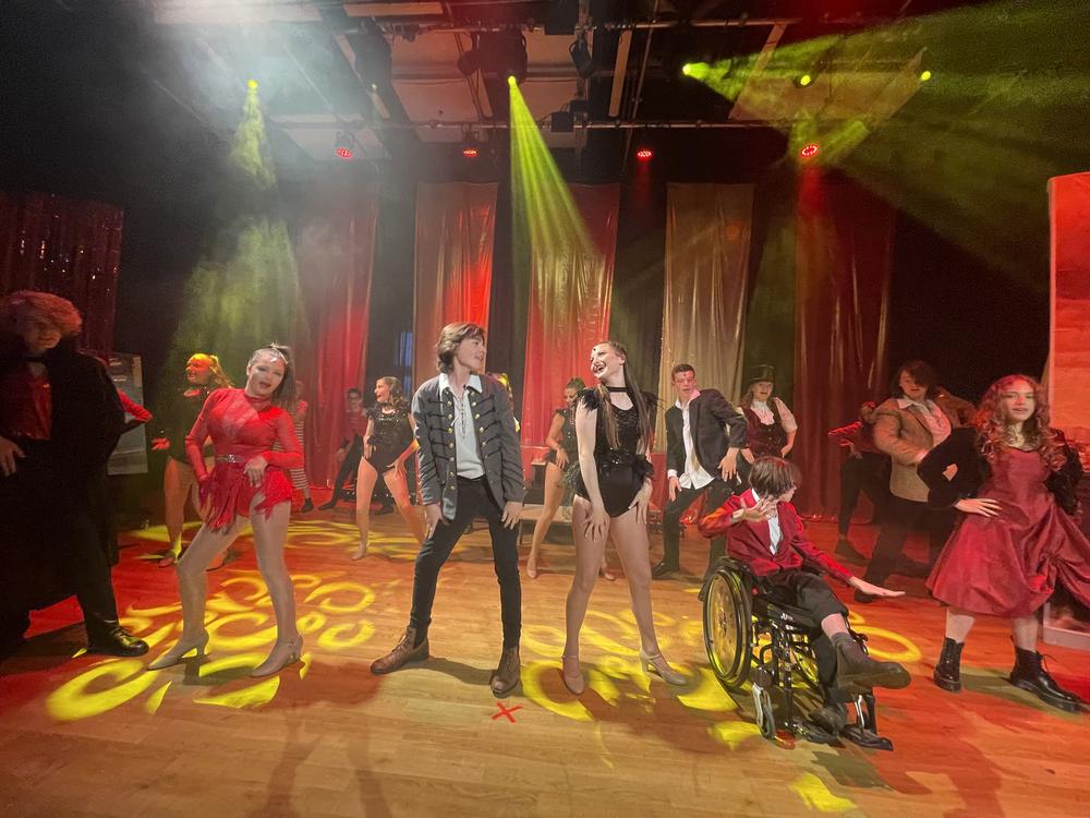 KSPA pupils performing on stage at The Whitstable School