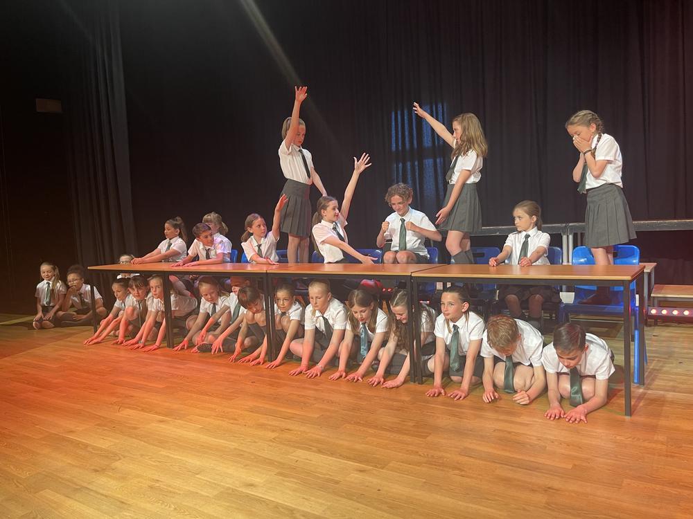 Movers pupils in costume during a KSPA showcase production
